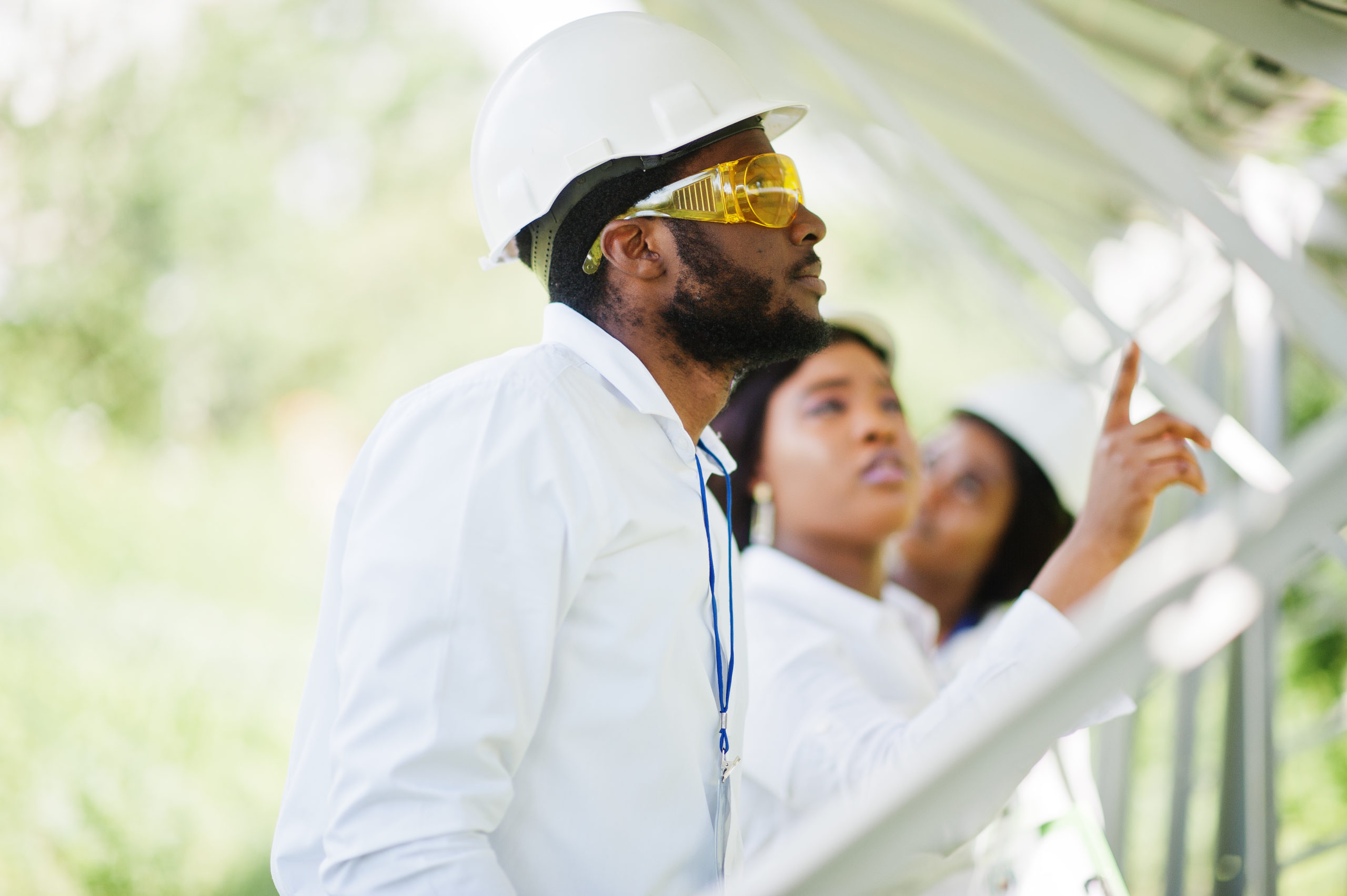 African american technician checks the maintenance of the solar